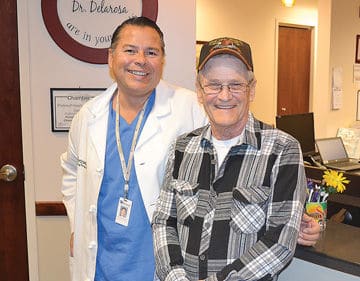 doctor with elderly patient