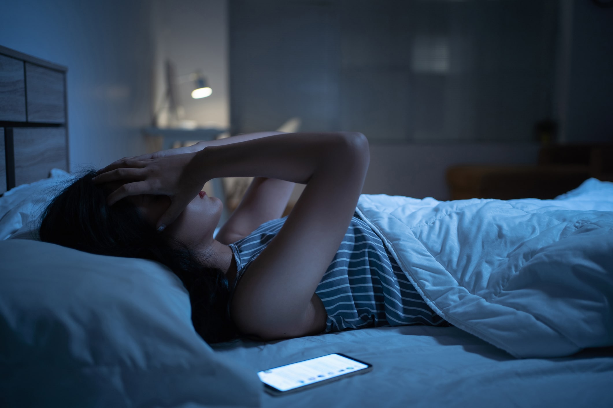 woman awake in bed